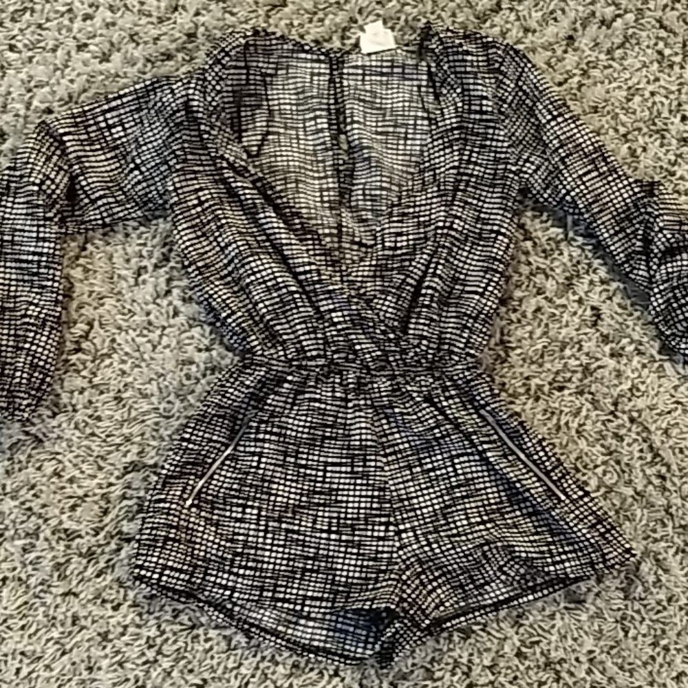 Split neck romper keyhole back zippered pockets